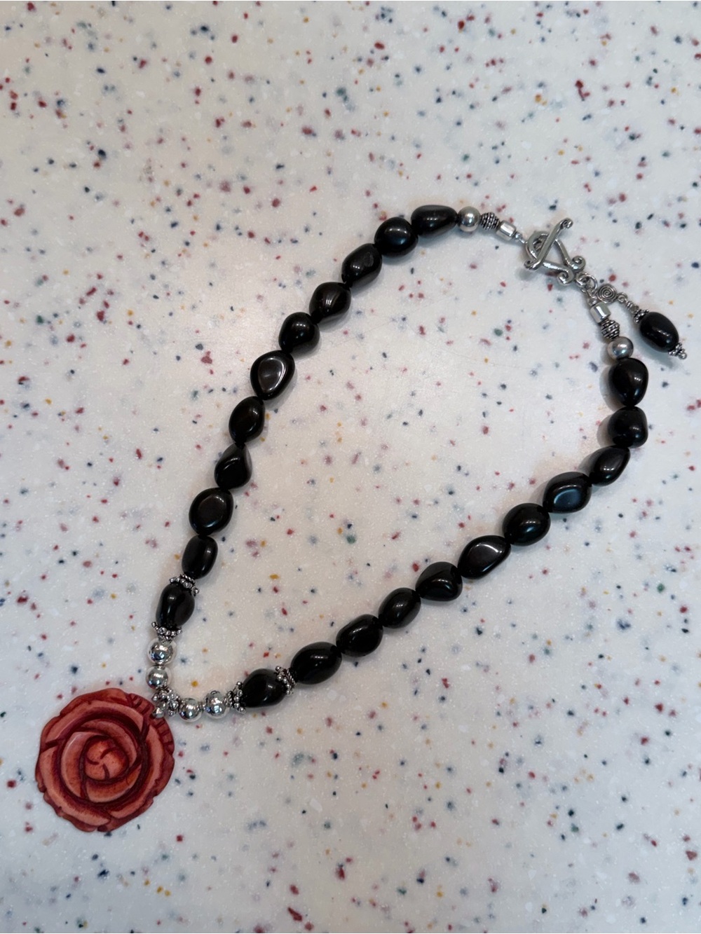 Black Bead Necklace with Red Rose Pendant